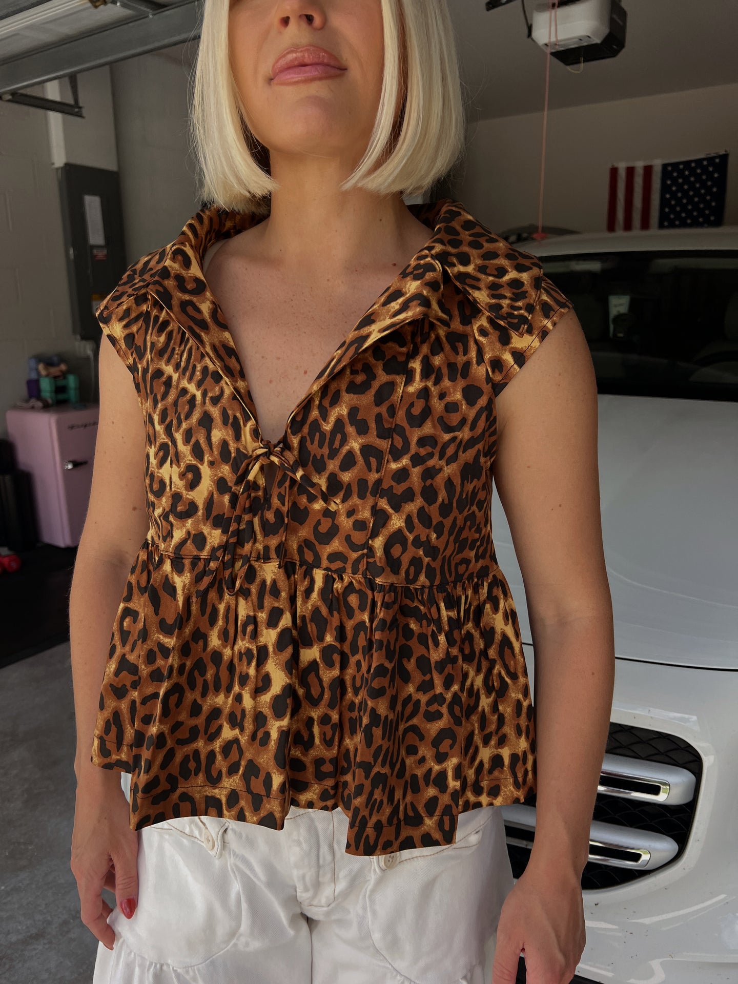 Galleria Leopard Sleeveless Ruffle Hem Tank